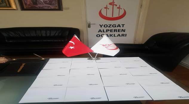 Alperenler’den esnafa nakdi yardım